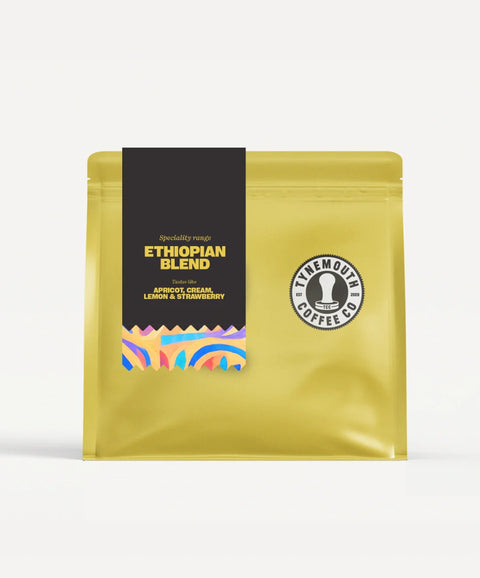 Yellow coffee package with a black label featuring 'Ethiopian Blend' on a white background